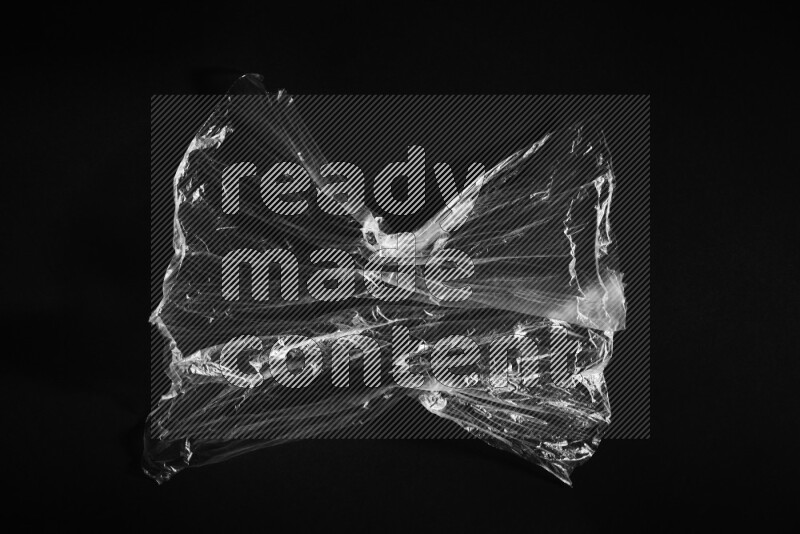 Transparent plastic textures on black background