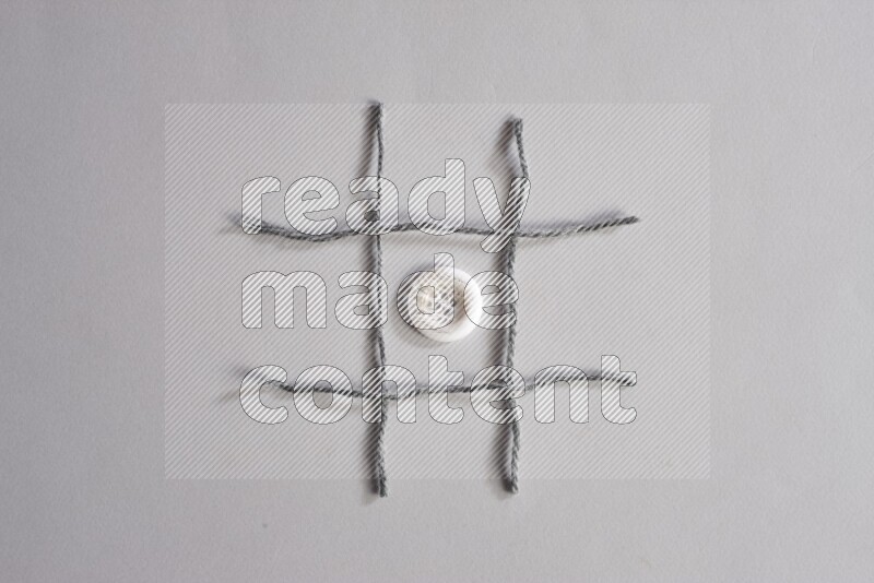 Multicolored buttons placed on grey background