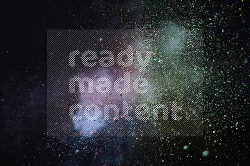 Colorful powder explosion on black background