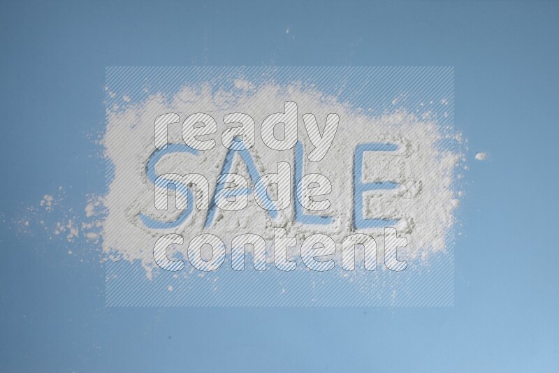A word written with white powder on blue background