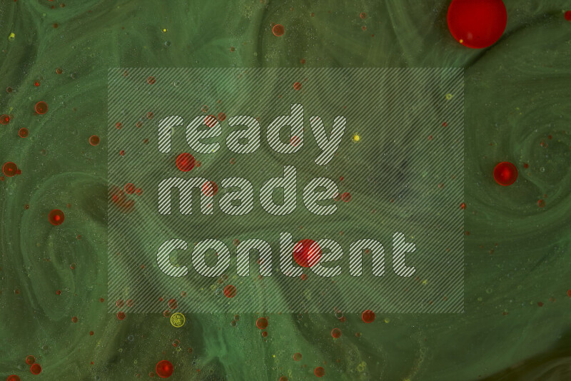 The image captures a dramatic splatter of red paint over a green backdrop