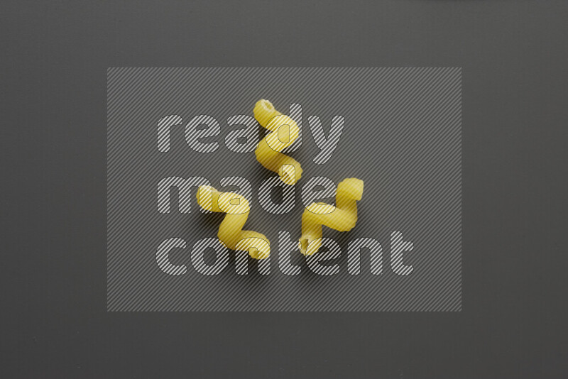 Twist pasta on grey background