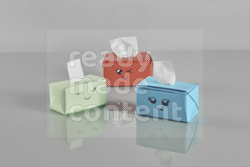 Origami tissue box on grey background