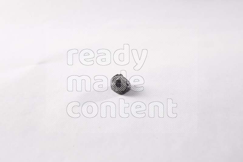 Dried plums on white background