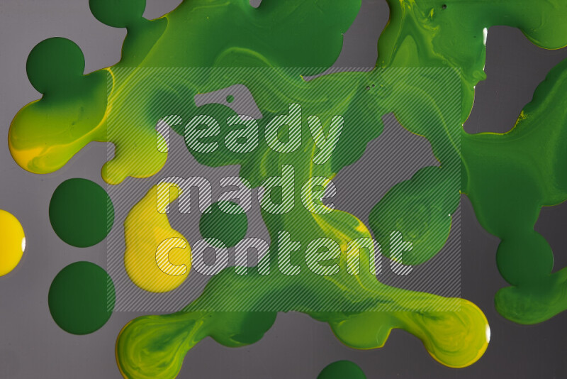 خلفية ملونة مع مزيج من ألوان الطلاء الأخضر والأصفر