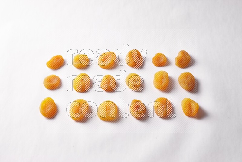 Dried apricots on white background