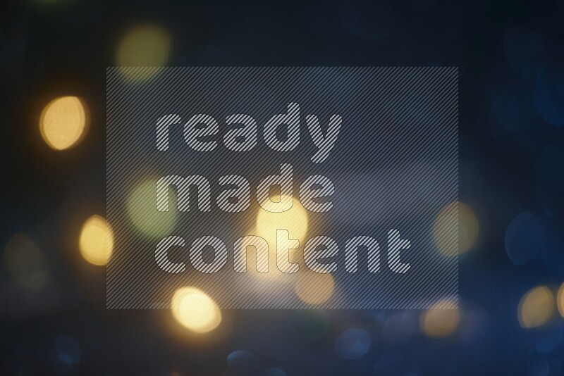 Bokeh light in yellow with blue background