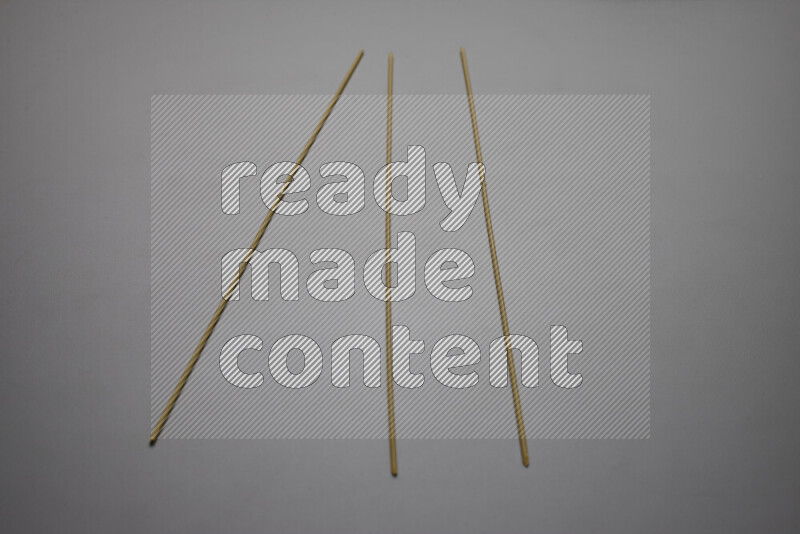 Spaghetti pasta on grey background