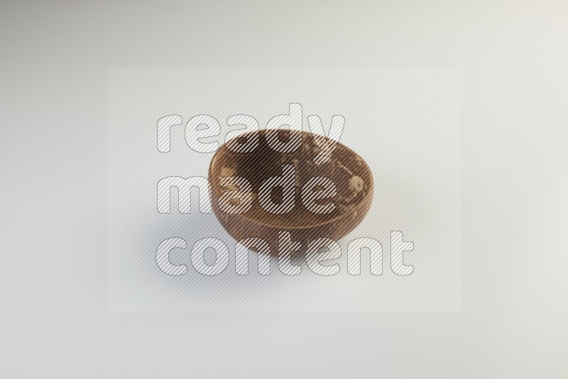 Wooden bowl and plate on white background