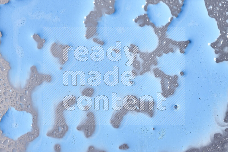 Close-ups of abstract blue paint texture in different shapes