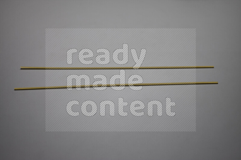 Spaghetti pasta on grey background