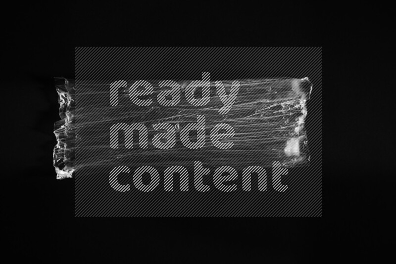 Transparent plastic textures on black background