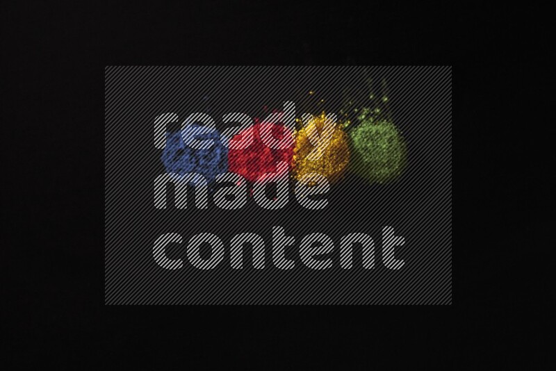 Colorful powder explosion on black background
