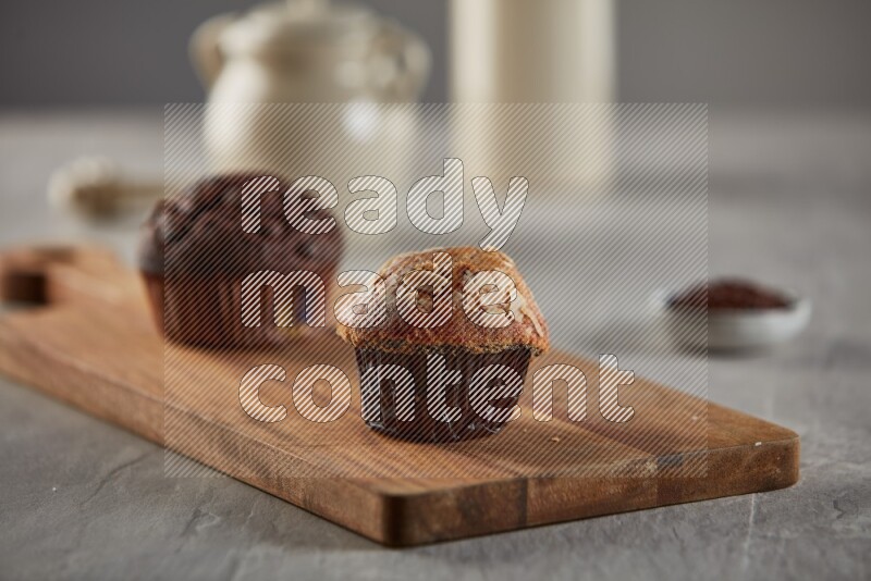 Peanut cupcake on a wooden board