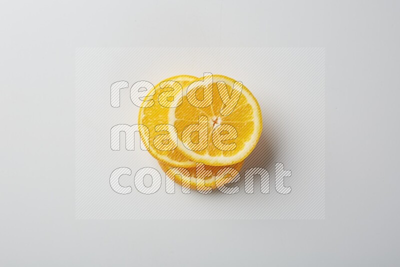 Three orange slices on a white background