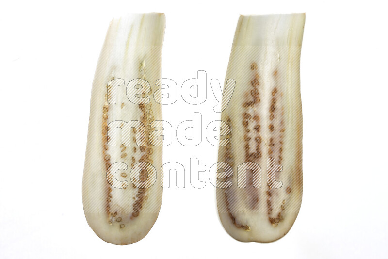Eggplant slices on illuminated white background