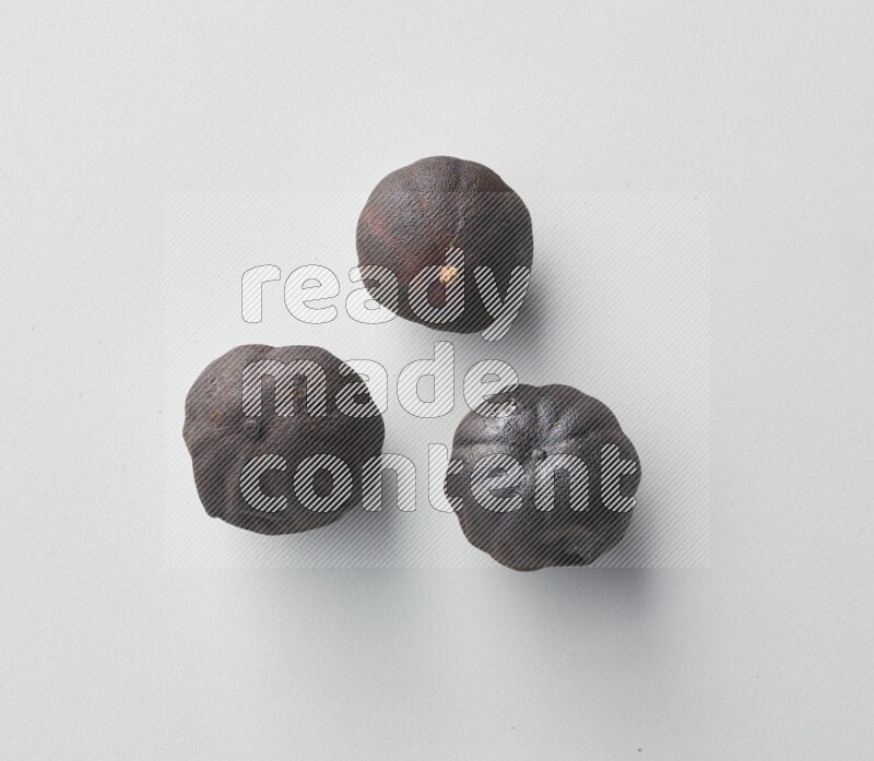 Top-view shot of dried lime (loomi) on white background