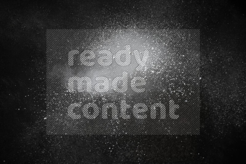 White powder explosion on black background