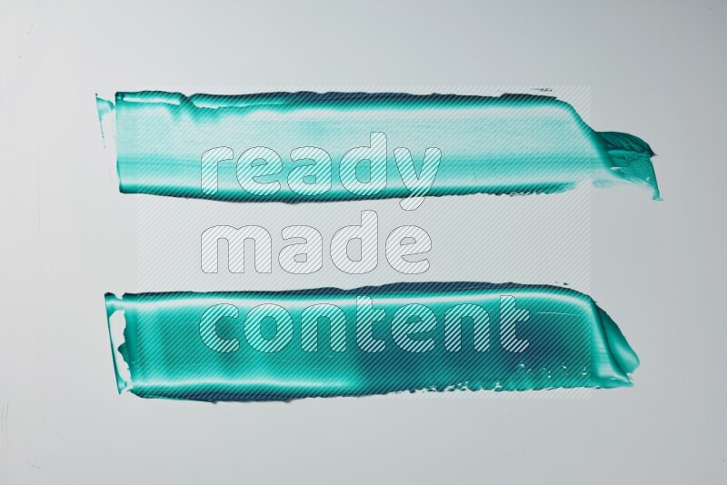 Turquoise painting knife strokes on white background
