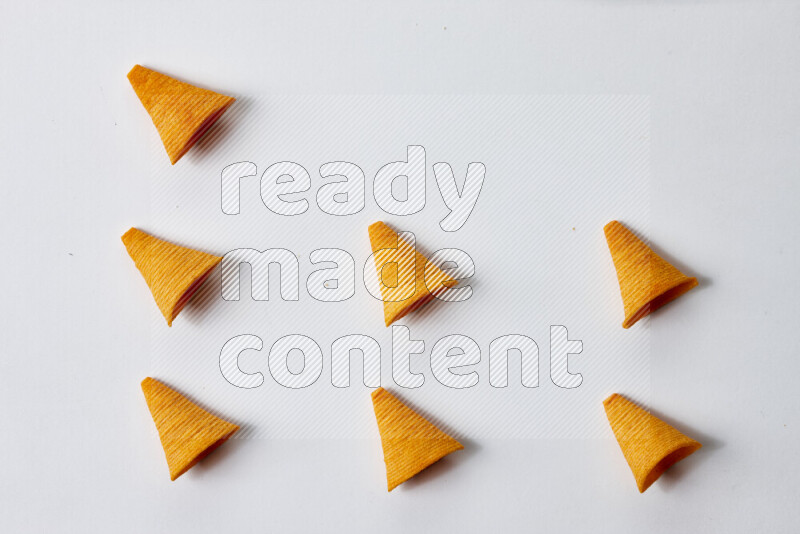 Assorted snacks on white background