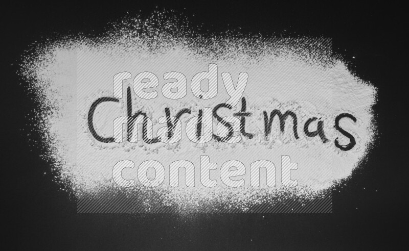 A word written with powder on black background