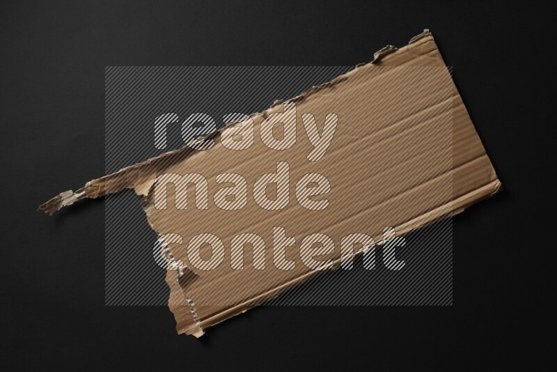 Cardboard on black background