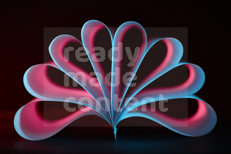 An abstract art piece displaying smooth curves in blue and red gradients created by colored light