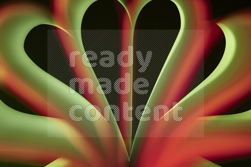 فن تجريدي يعرض منحنيات وتدرجات اللون الأخضر والبرتقالي مكونه بضوء ملون