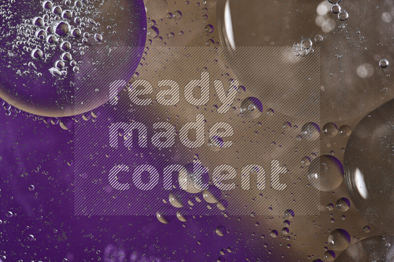 Close-ups of abstract oil bubbles on water surface in shades of purple and brown