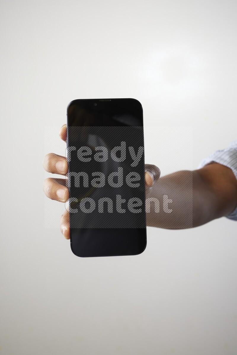 Male hand holding Smart phone on White background