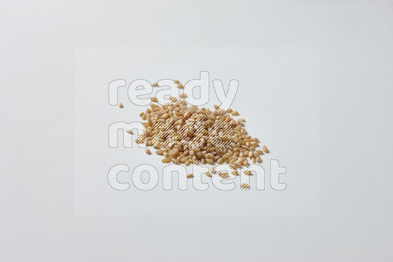 Hulled wheat on white background
