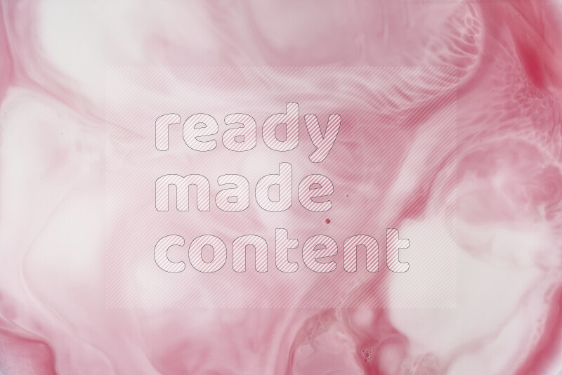 A close-up of abstract swirling patterns in red and white