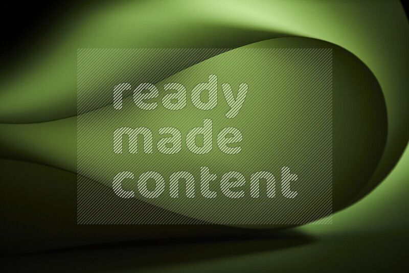 فن تجريدي يعرض منحنيات وتدرجات اللون الأخضر مكونه بضوء ملون