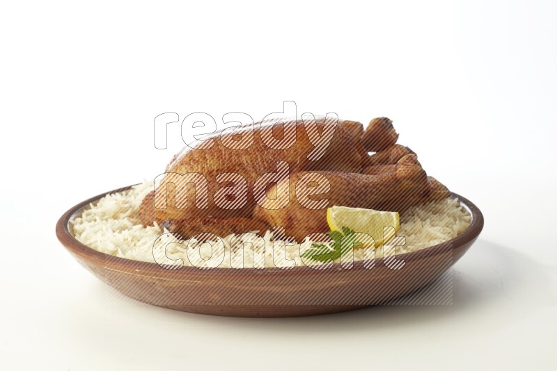 white  basmati Rice with  whole roasted chicken    on a pottery plate  direct  on white background