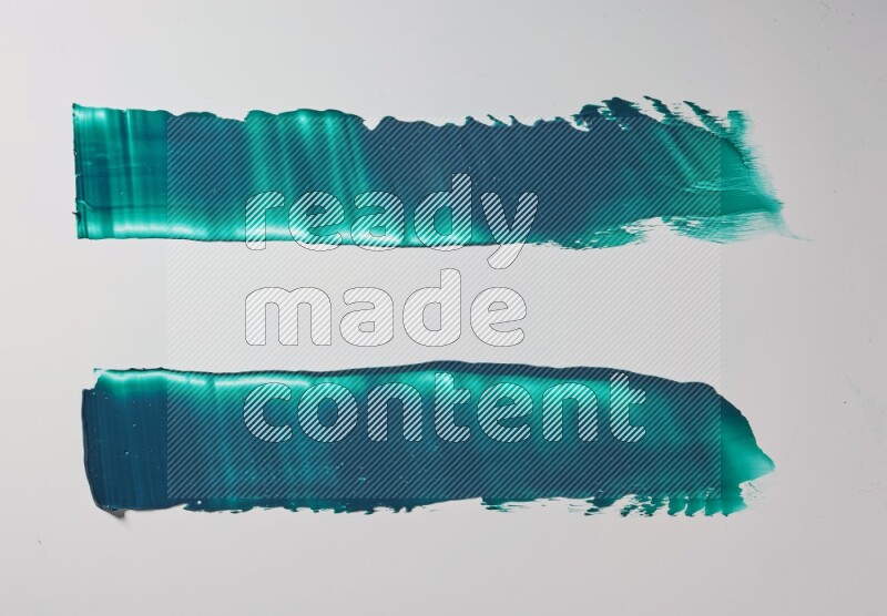 Turquoise painting knife strokes on white background