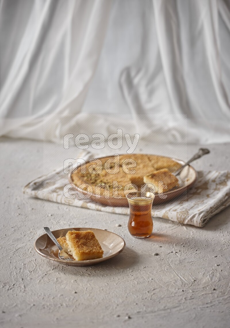 Konafa with tea in a light setup