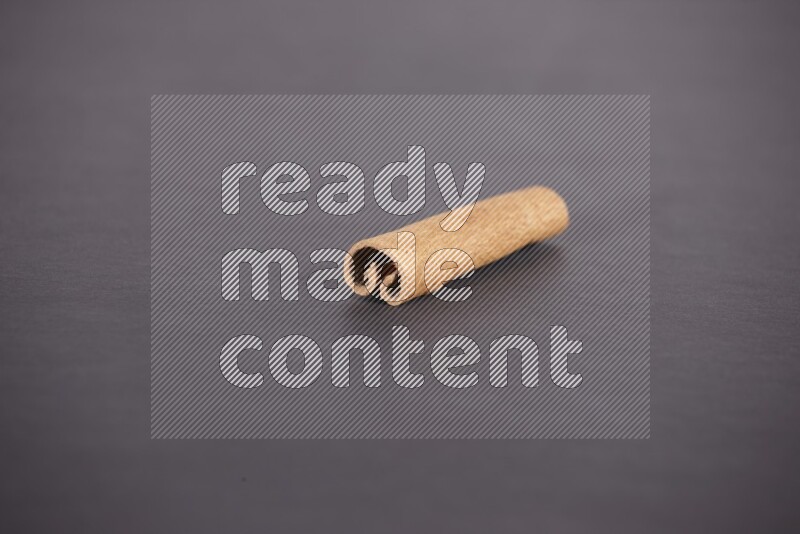 Cinnamon stick on black background