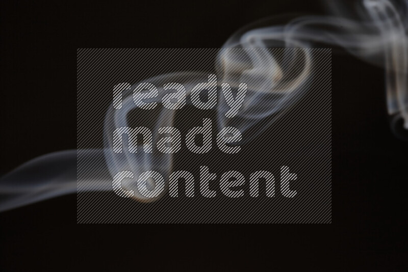 Motion of wavy smoke isolated on dark background