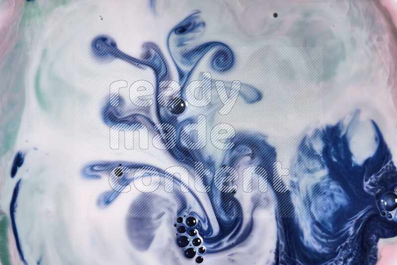 لقطة مقربة لأنماط دوامية باللون الأحمر والأخضر والأبيض والأزرق