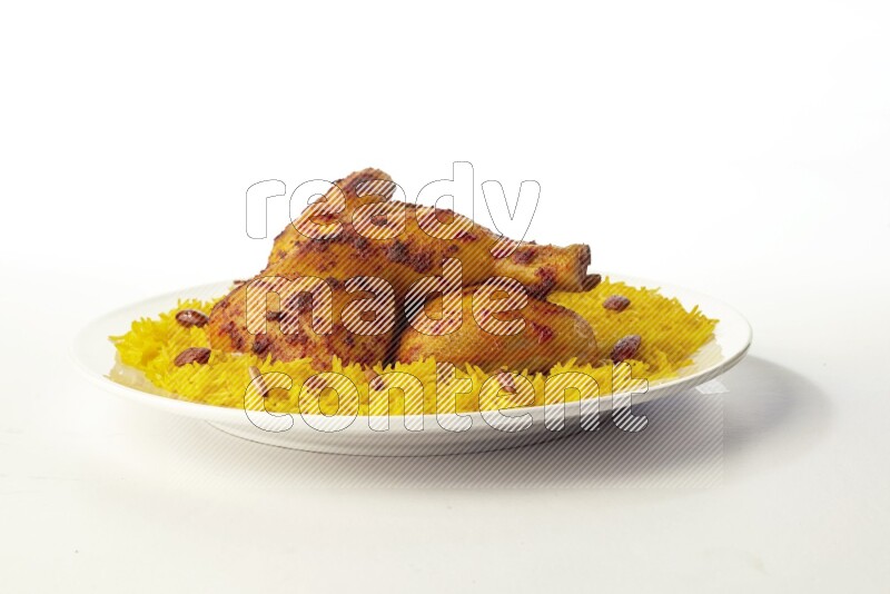 yellow basmati Rice with kabsa chicken pieces on a white rounded plate direct on white background