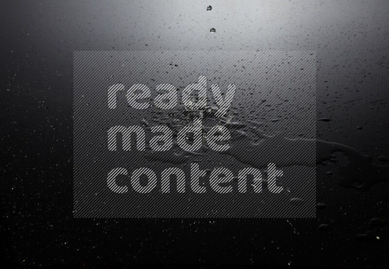 water drops, and droplets on black background