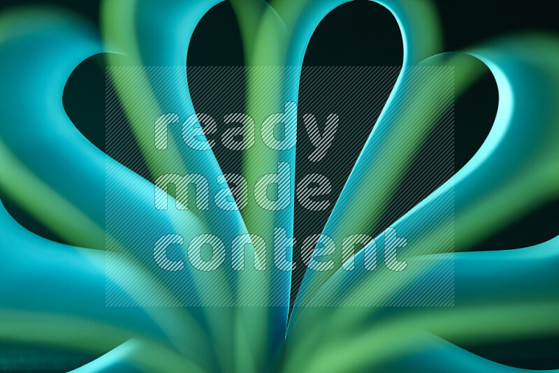 An abstract art piece displaying smooth curves with green gradients created by colored light