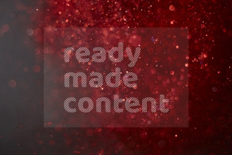 Red glitter powder isolated on black background