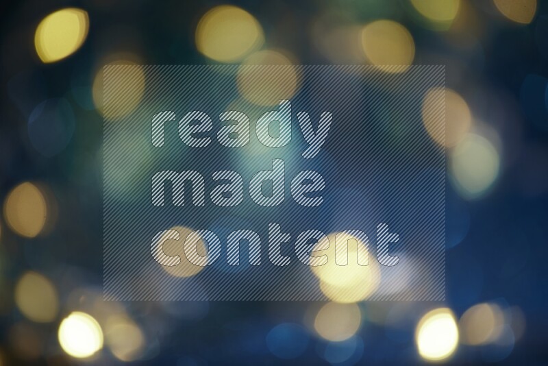 Bokeh light in yellow with blue background