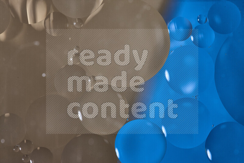 Close-ups of abstract oil bubbles on water surface in shades of blue and brown