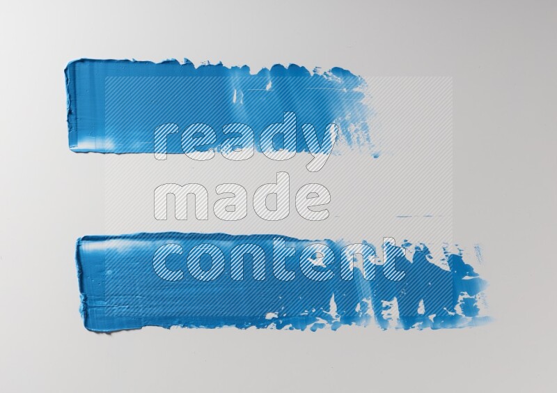 Blue painting knife strokes on white background
