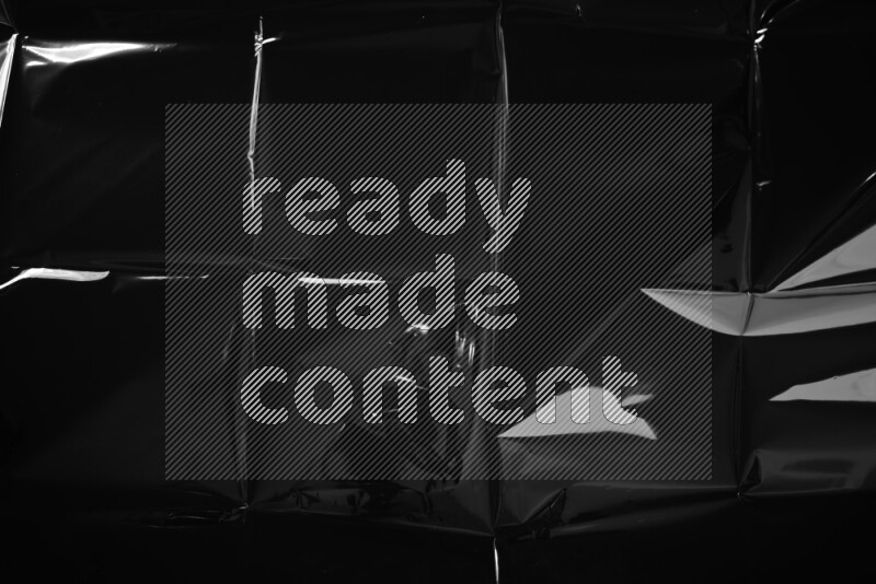 Plastic wrap texture on black background