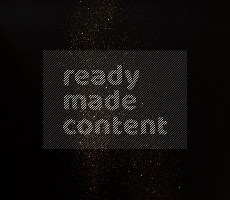 Gold glitter powder isolated on black background