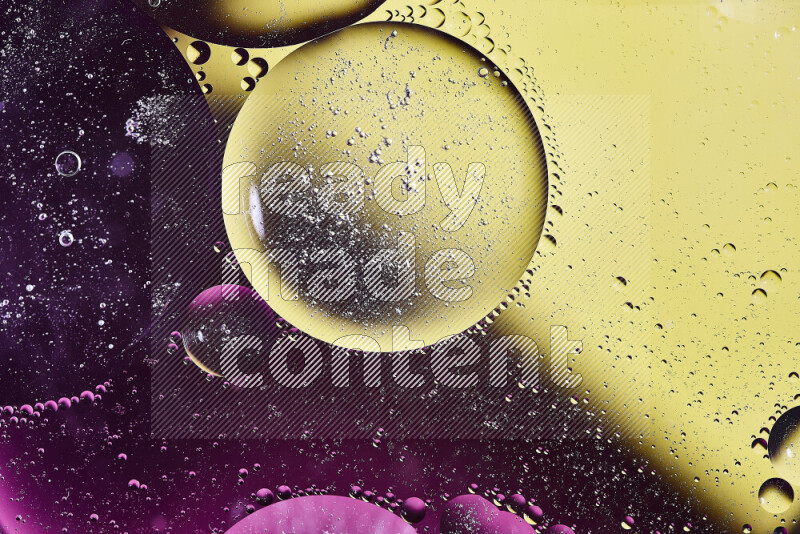 Close-ups of abstract oil bubbles on water surface in shades of yellow and pink