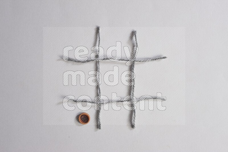 Wooden buttons placed on grey background